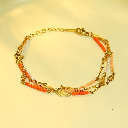 Bracelet Dorés Triple Chaîne Détails Oranges