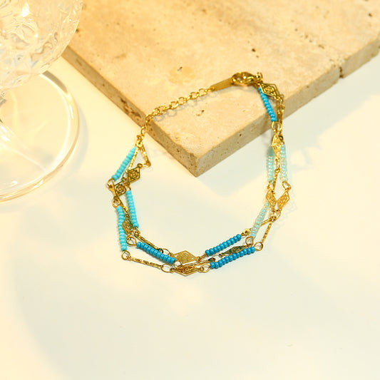 Bracelet Dorés Triple Chaîne Détails Bleus