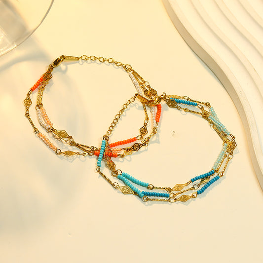 Bracelet Dorés Triple Chaîne Détails Bleus