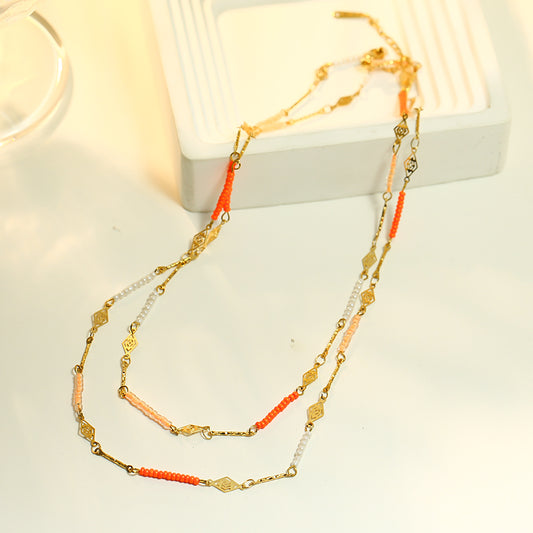 Collier Doré Double Chaîne Détails Oranges