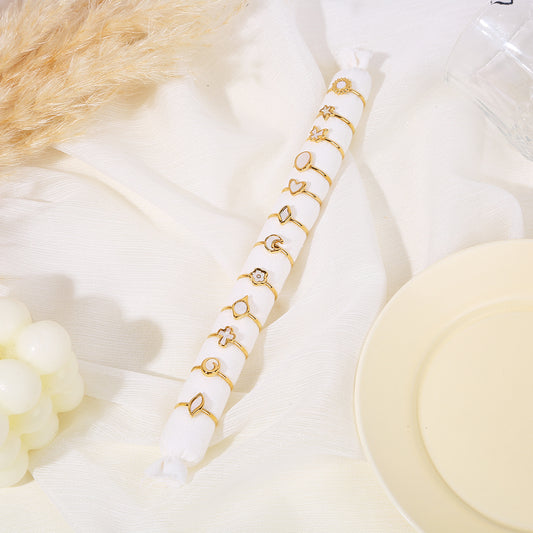 Lot de 12 bagues dorées avec nacre