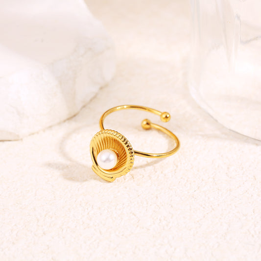 Bague fine dorée coquillage perle