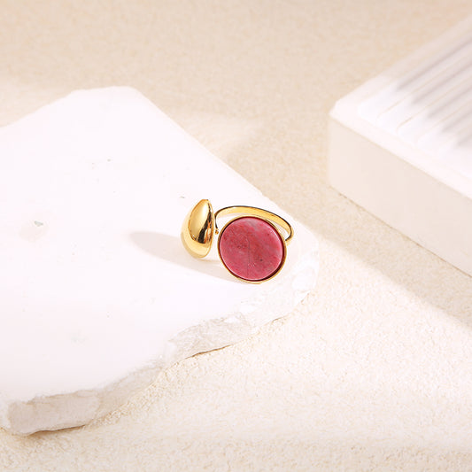 Bague dorée ouverture avant goutte effet miroir et cercle pierre