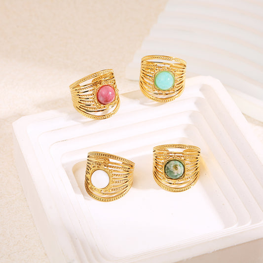 Bague dorée multi lignes pierre ronde blanche