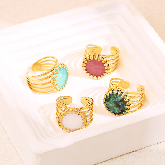 Bague dorée multi ligne griffe pierre bleue