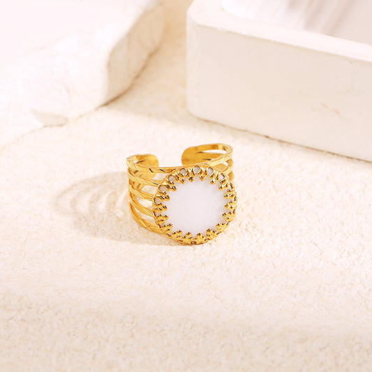 Bague dorée multi ligne griffe pierre blanche