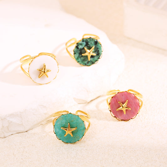 Bague dorée pierre bleue étoile de mer