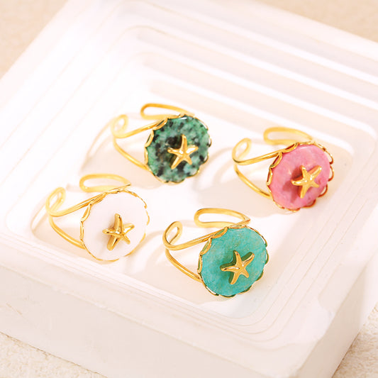 Bague dorée pierre blanche étoile de mer