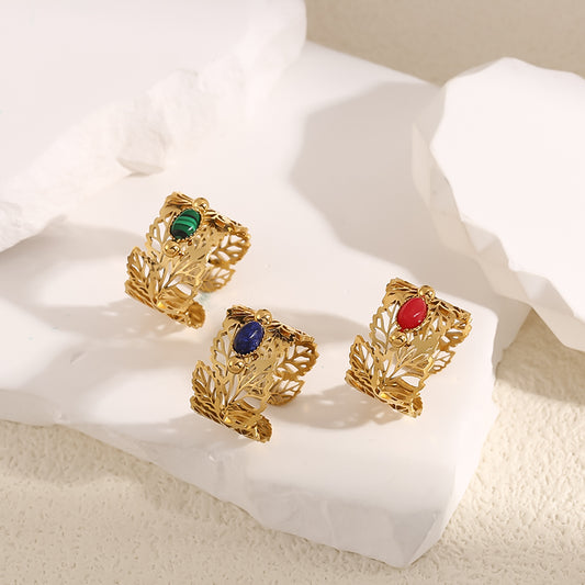 Bague Dorée Motif Feuilles Avec Pierre Ovale Rouge