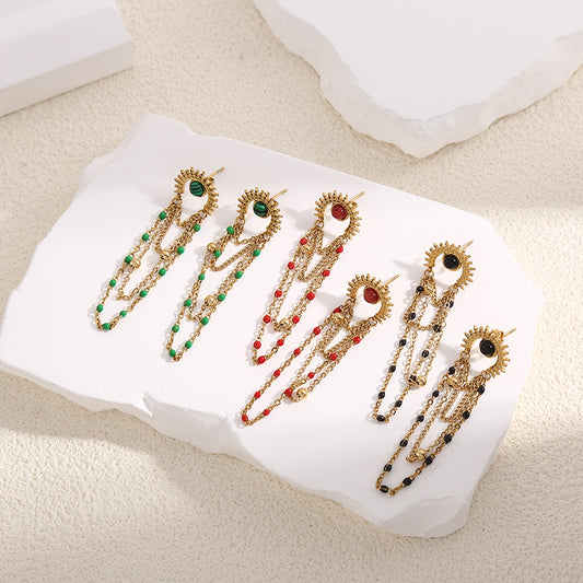 Boucles d'Oreilles Dorées Eclat Avec Pierres Noires Et Chaînes Noires