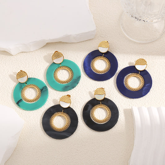 Boucles d'Oreilles Dorées Disques Noires Avec Anneaux