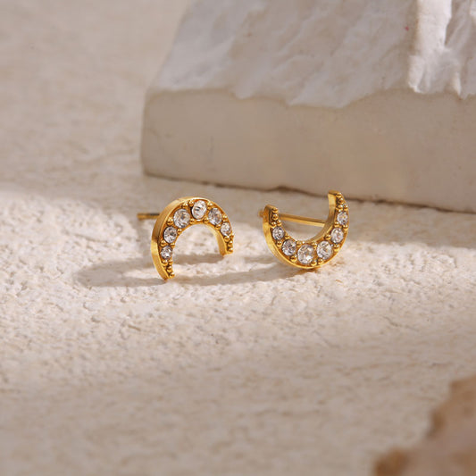Clous d'Oreilles Dorés Demi Lune Strassée