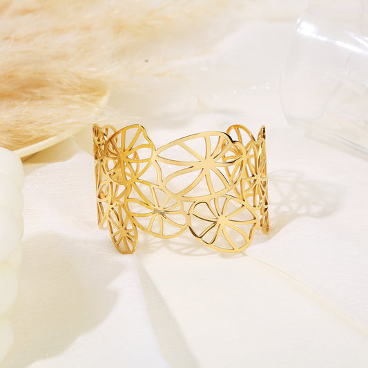 Bracelet manchette doré style nénuphars ajourés