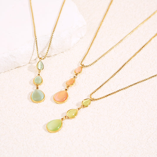 Collier chaîne dorée en Y avec pierres œil de chat rose