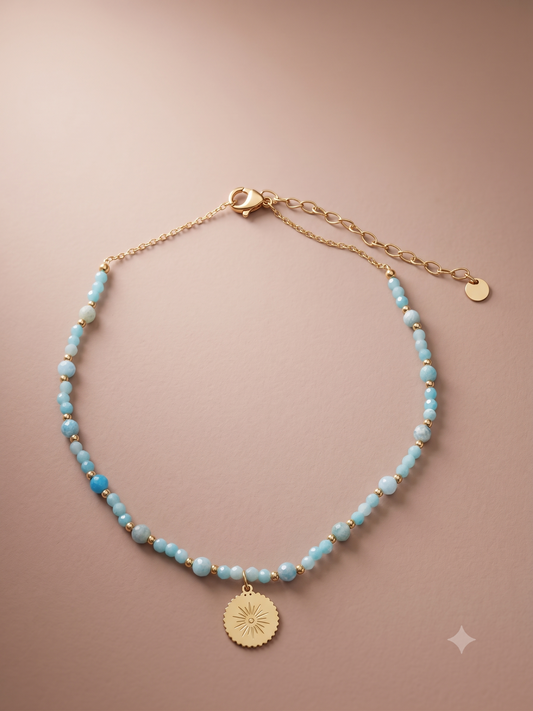 Chaîne de cheville à perles et pendentif soleil rayonnant