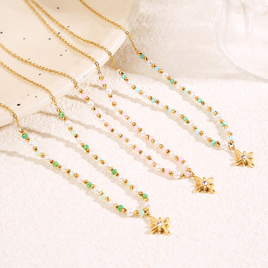 Collier doré cristaux roses pendentif étoile strass