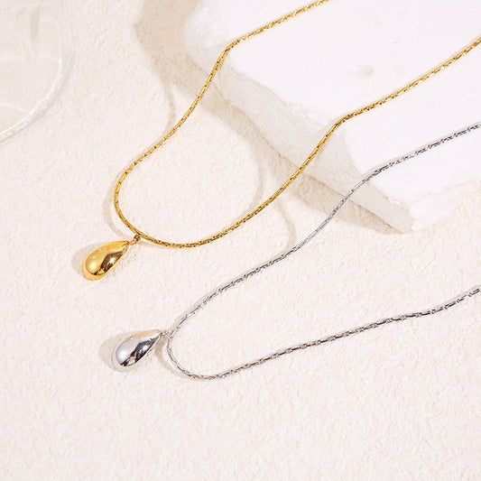 Collier chaîne serpent fine dorée avec pendentif goutte allongée effet miroir