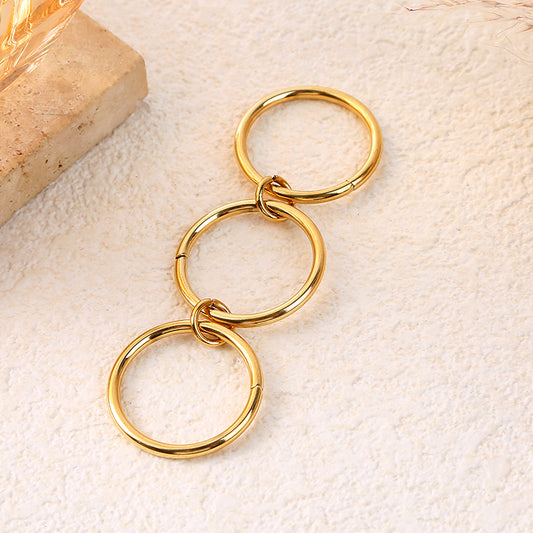 Bague fine triple anneaux doré finition effet miroir