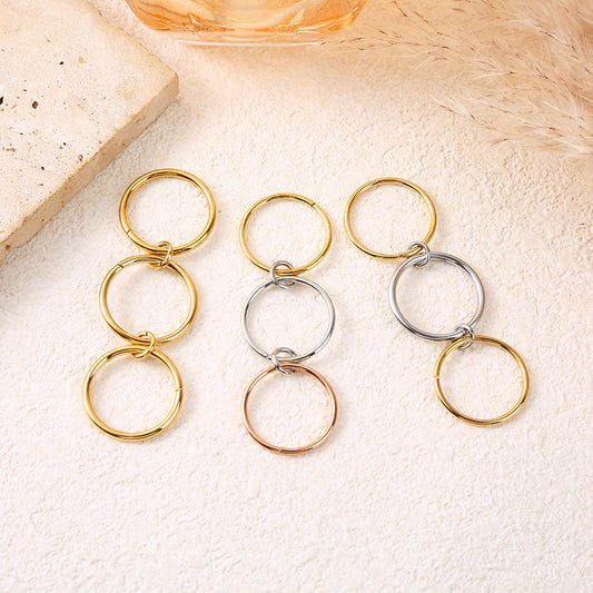 Bague fine triple anneaux doré finition effet miroir