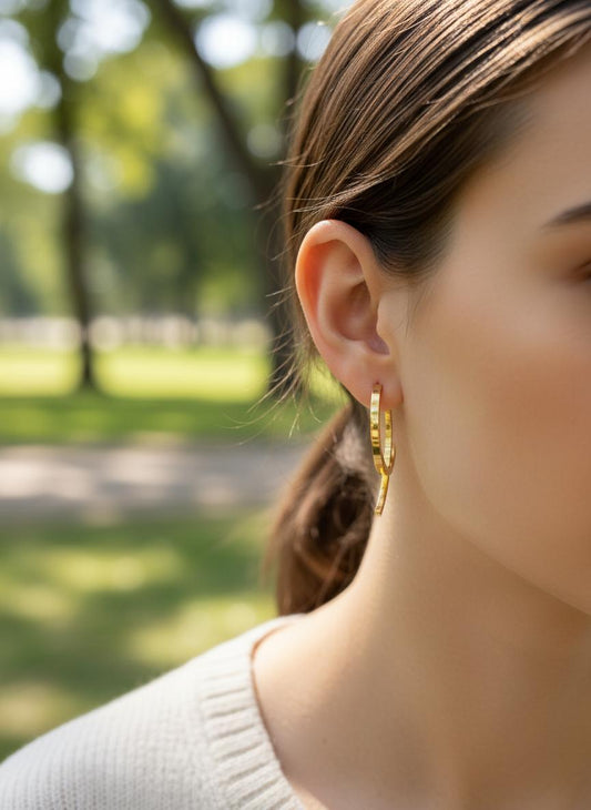 Boucles d’oreilles double arc entrelacé