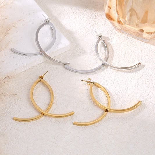 Boucles d’oreilles argentées double arc entrelacé