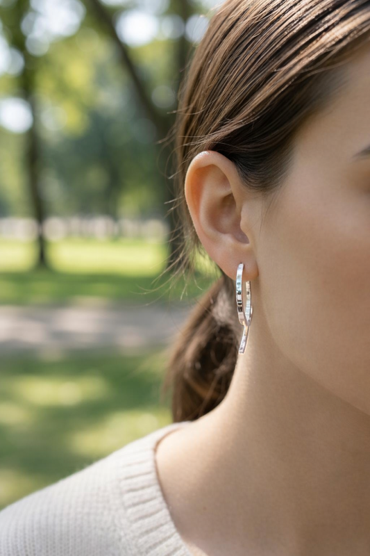 Boucles d’oreilles double arc entrelacé