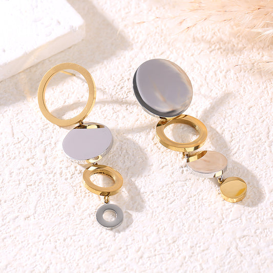 Boucles d'oreilles pendantes bicolores cercles ajourés et pleins