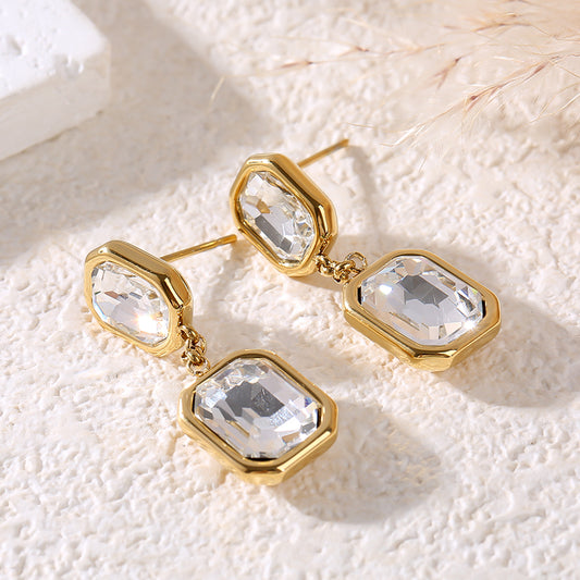 Boucles d’oreilles dorées à double pendentif rectangulaire en cristal facetté