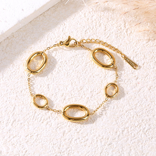 Bracelet chaîne dorée avec 5 anneaux ovales