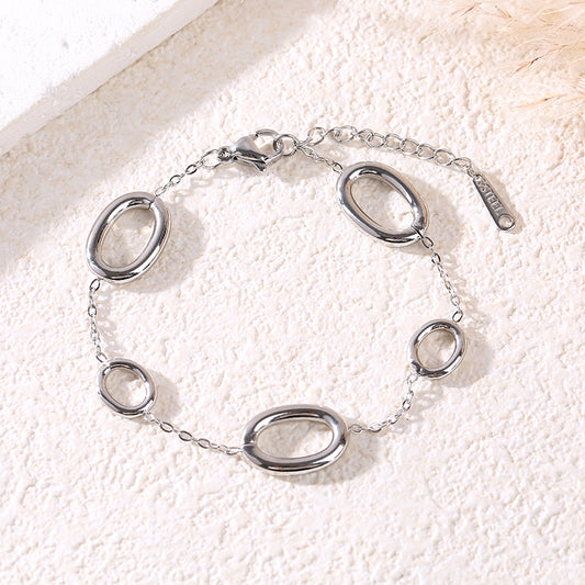 Bracelet chaîne argentée avec 5 anneaux ovales