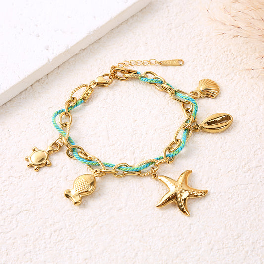 Bracelet chaîne dorée cordon turquoise charms marin