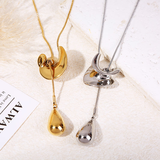 Collier sautoir ajustable doré chaîne serpent pendentif goutte bombée