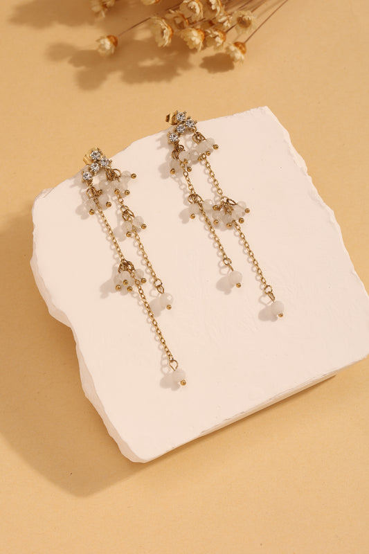 Boucles d'Oreilles Pendantes Dorées Avec Strass Pierres Blanches Et Chaînes Fines