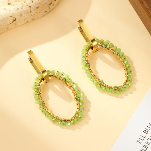 Boucles d'oreilles Créoles Dorées Ovale Tissé de Pierres Vertes et Strass