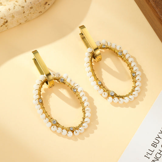Boucles d'oreilles Créoles Dorées Ovale Tissé de Pierres Blanches et Strass