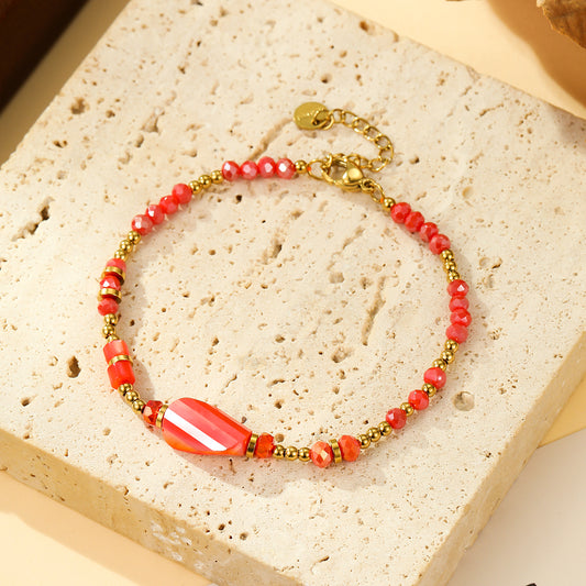 Bracelet Perles Rouges et Dorées Avec Pierre Facettée Centrale