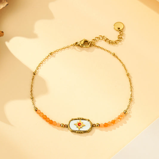 Bracelet Doré Médaillon Étoile Strass et Pierres Cornaline