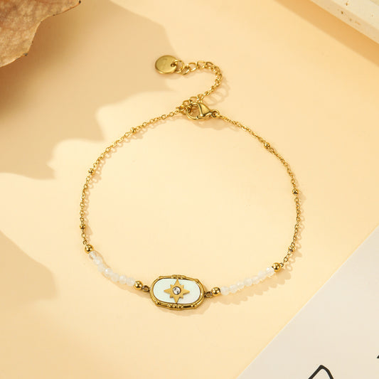 Bracelet Doré Médaillon Étoile Strass et Pierres de Lune