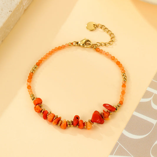 Bracelet Doré Perles Facettées Orange Brûlé et Éclats de Cornaline