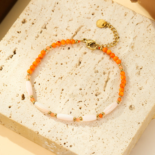Bracelet Doré Perles Cornaline Orange et Éclats de Nacre Allongés