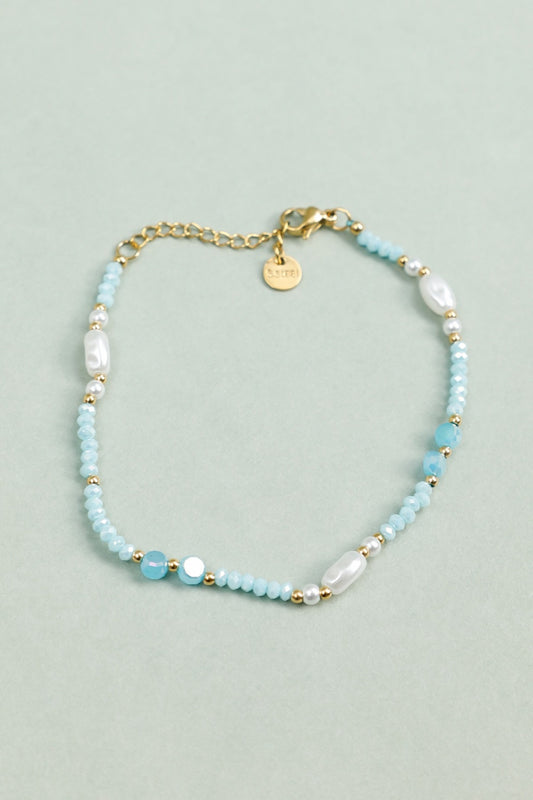 Bracelet Perles Bleues et Blanches Nacrées Avec Détails Dorés