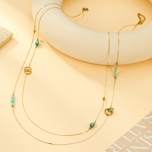 Collier Sautoir Fin Perles Bleues Turquoises et Détails Anneaux Dorés