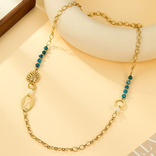 Collier Sautoir Chaîne Dorée et Pendentif Feuille Tropicale