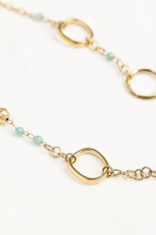 Collier Sautoir Doré Grands Anneaux Texturés Avec Perles Bleu Clair Facettées
