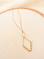 Collier long chaîne fine dorée avec pendentif losange