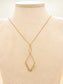 Collier long chaîne fine dorée avec pendentif losange