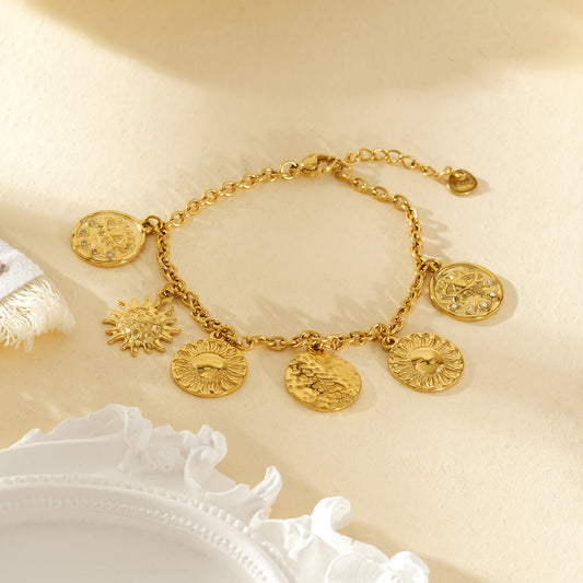 Bracelet chaîne dorée breloques rondes