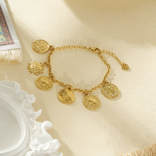 Bracelet chaîne dorée breloques rondes