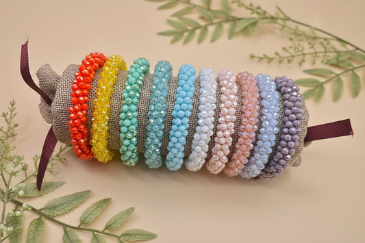 Lot de 10 bracelets élastiques colorés sur présentoir