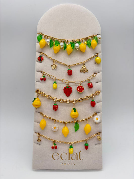 Lot de 6 bracelets fruités sur présentoir